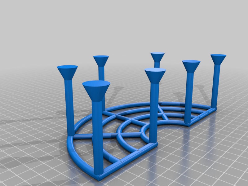 a group of blue candles sitting on top of a table