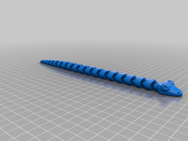 a blue plastic object on a gray surface