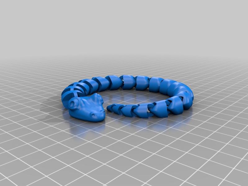 a blue plastic object on a gray surface