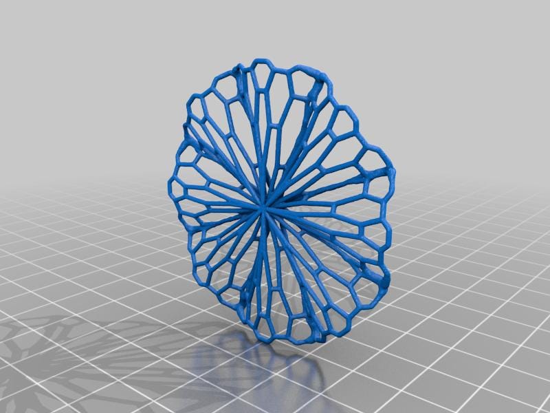 a blue object is sitting on a gray surface