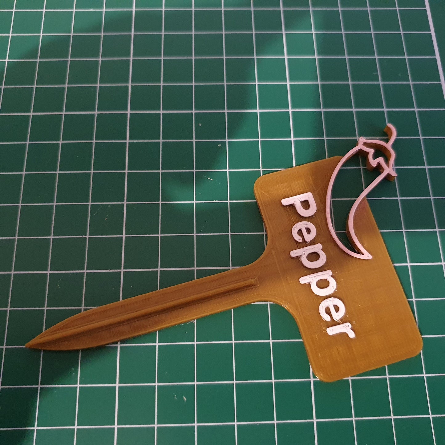 a pair of scissors sitting on top of a cutting board