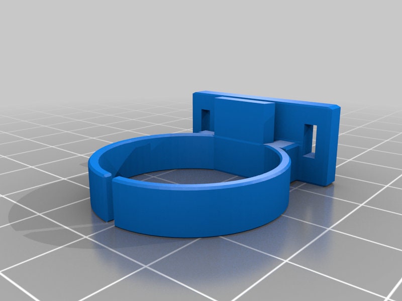 a blue object sitting on top of a tiled floor
