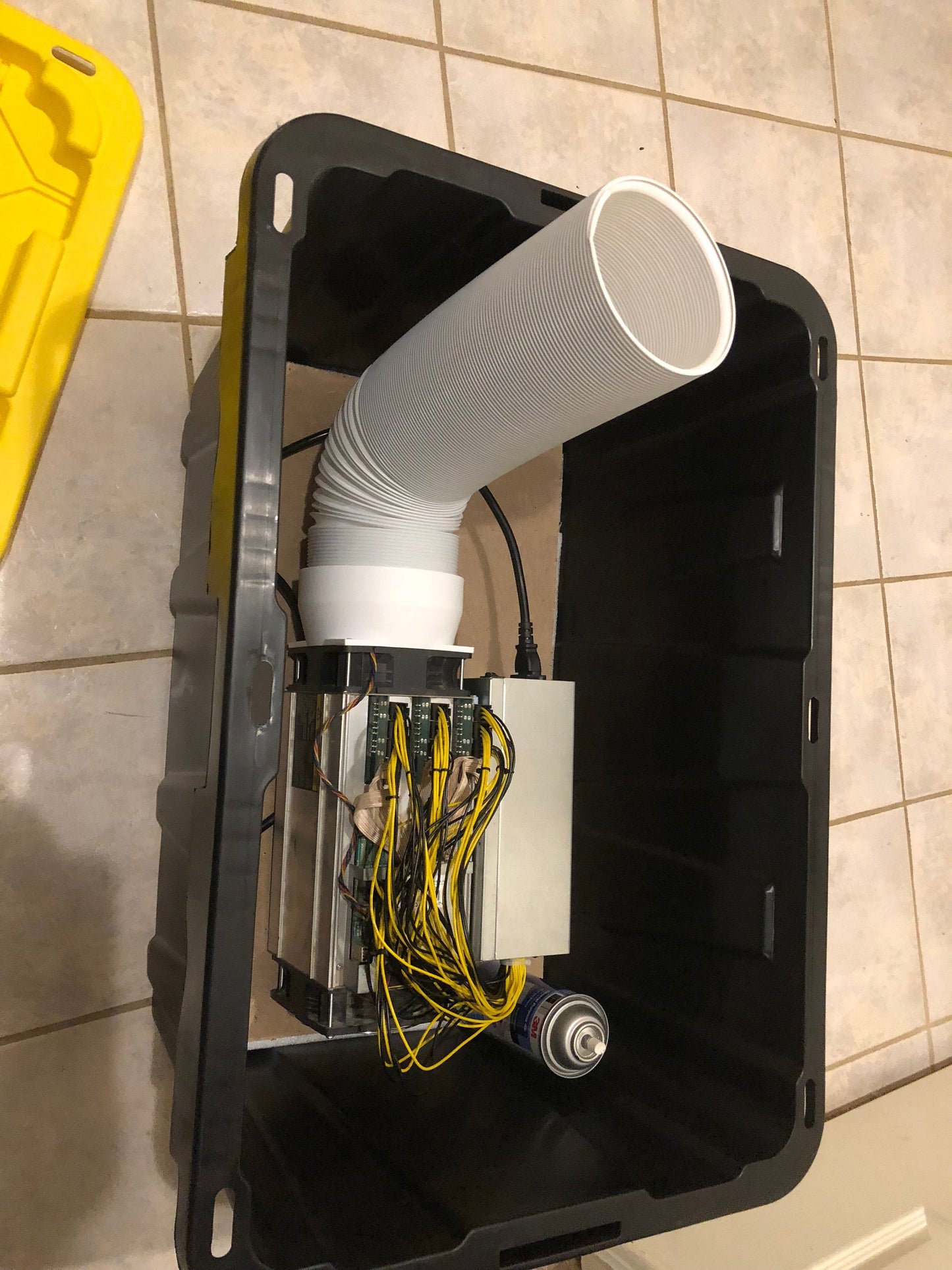 a blow dryer sitting inside of a black box