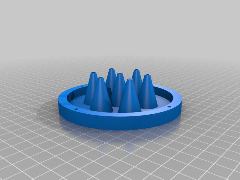 a 3d model of a blue ring with cones