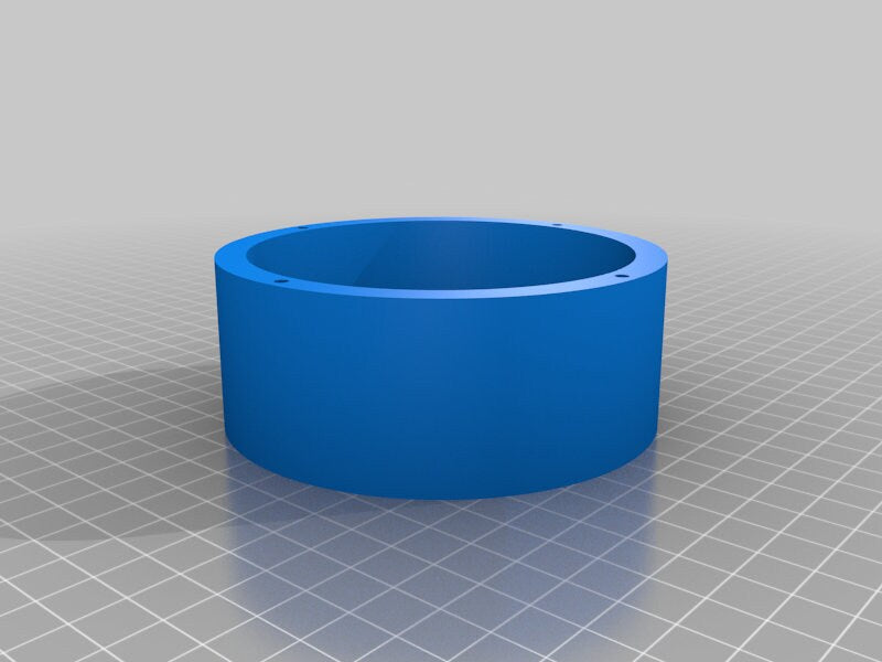 a 3d image of a blue object on a gray surface