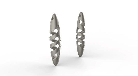 a pair of silver earrings on a white background