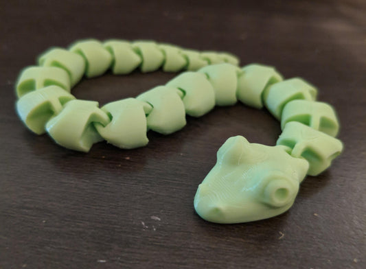 a close up of a toy animal on a table